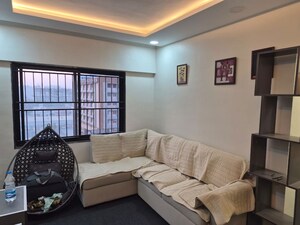 Living Room in 2 BHK Apartment at Kohinoor Sapphire, Tathawade – for Sale
