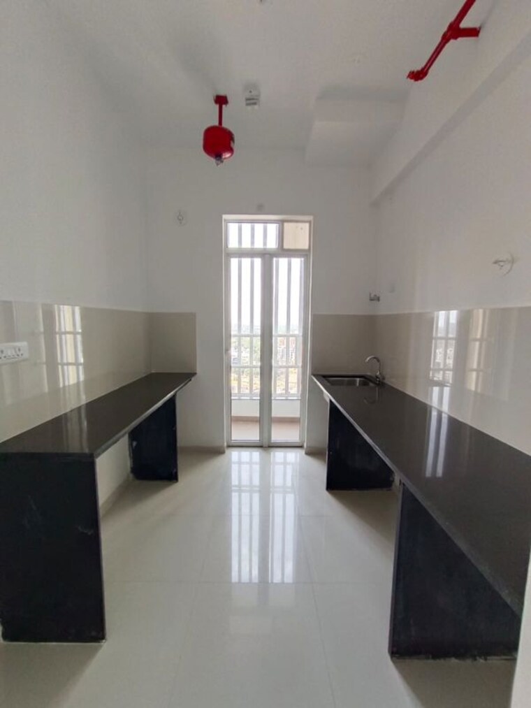 Kitchen, runwal-the-central-park 3 Bedroom 1550 Sq.Ft. Apartment In Chinchwad Pune 10646581