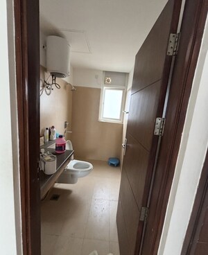 Bathroom in 2 BHK Apartment at Puri Emerald Bay, Sector 104 – for Rent
