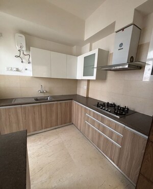 Kitchen in 2 BHK Apartment at Puri Emerald Bay, Sector 104 – for Rent