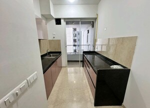 Kitchen in 2 BHK Apartment at Courtyard by Narang Realty and The Wadhwa Group, Pokhran Road No Two – for Rent