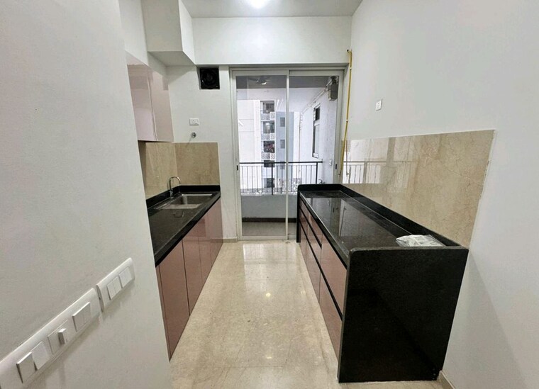 Kitchen, courtyard-by-narang-realty-and-the-wadhwa-group 2 Bedroom 840 Sq.Ft. Apartment In Pokhran Road No Two Thane 10646722