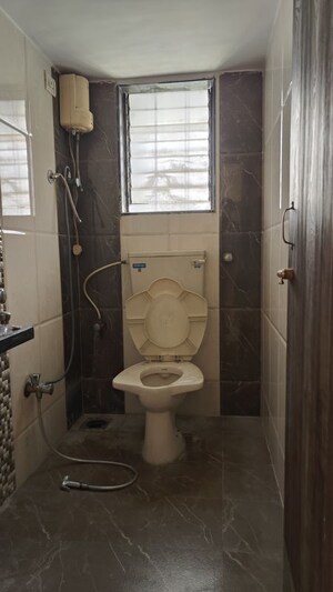 Bathroom in 2 BHK Apartment at Suyog Nagar CHS, Vasai West – for Sale