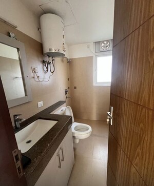 Bathroom in 3 BHK Apartment at Puri Emerald Bay, Sector 104 – for Rent