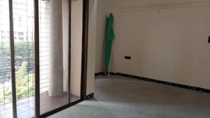 Room in 1 BHK Apartment at Apeksha CHS, Andheri West – for Sale