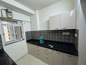 Kitchen in 1 BHK Apartment at Lodha Amara Tower 44, Kolshet Road – for Rent