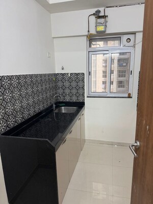 Kitchen in 1 BHK Apartment at Lodha Amara Tower 44, Kolshet Road – for Rent