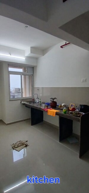 Kitchen in 1 BHK Apartment at Puranik Tokyo Bay Phase 2A, Kasarvadavali – for Rent