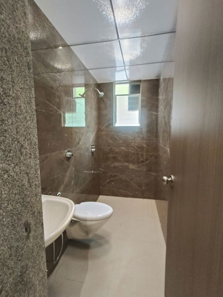 Bathroom, sigma-centuria 2 Bedroom 674 Sq.Ft. Apartment In Kale Padal Pune 10646815