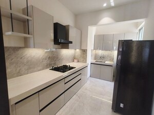Kitchen in 2 BHK Apartment at Sigma Centuria, Kale Padal – for Sale
