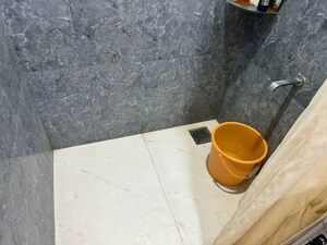 Bathroom in 2 BHK Apartment at Royal Palms Garden View, Goregaon East – for Rent