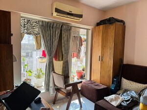 Living Room in 2 BHK Apartment at Royal Palms Garden View, Goregaon East – for Rent