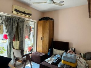 Living Room in 2 BHK Apartment at Royal Palms Garden View, Goregaon East – for Rent