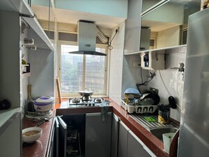 Kitchen in 2 BHK Apartment at Royal Palms Garden View, Goregaon East – for Rent