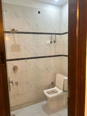 Bathroom in 2 BHK Builder Floor at Niti Khand I – for Rent