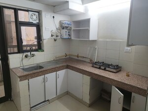 Kitchen in 2 BHK Apartment at Logix Blossom County, Sector 137 – for Sale