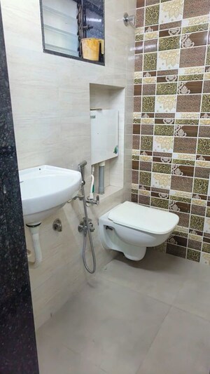 Bathroom in 1 RK Apartment at Dolphin Makhdoomi Palace, Santacruz East – for Sale