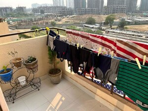 Balcony in 2 BHK Apartment at Signature Global Orchard Avenue, Sector 93 – for Rent
