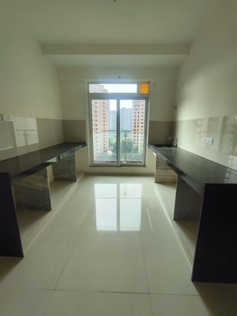 Kitchen, rustomjee-verdant-vistas 4 Bedroom 1760 Sq.Ft. Apartment In Majiwada Thane 10647145