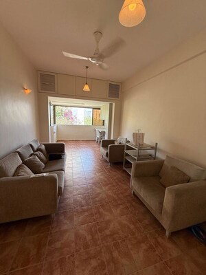 Living Room in 1 BHK Apartment at Candy Castle, Colaba – for Rent