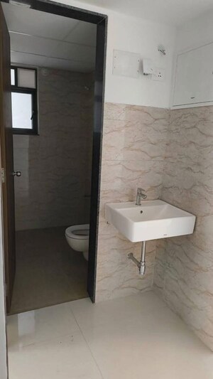 Bathroom in 3 BHK Apartment at Shapoorji Pallonji Sensorium, Hinjewadi – for Rent