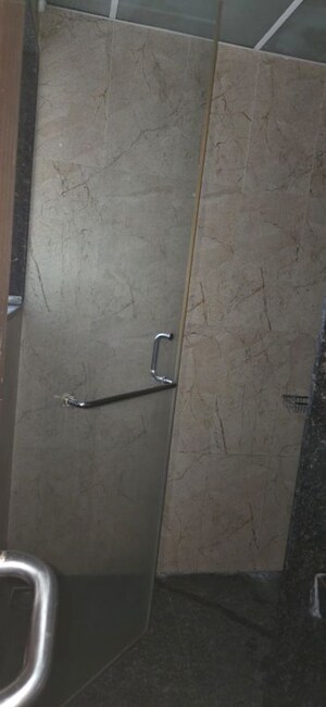 Bathroom in 3 BHK Apartment at Kumar Peninsula, Baner – for Rent