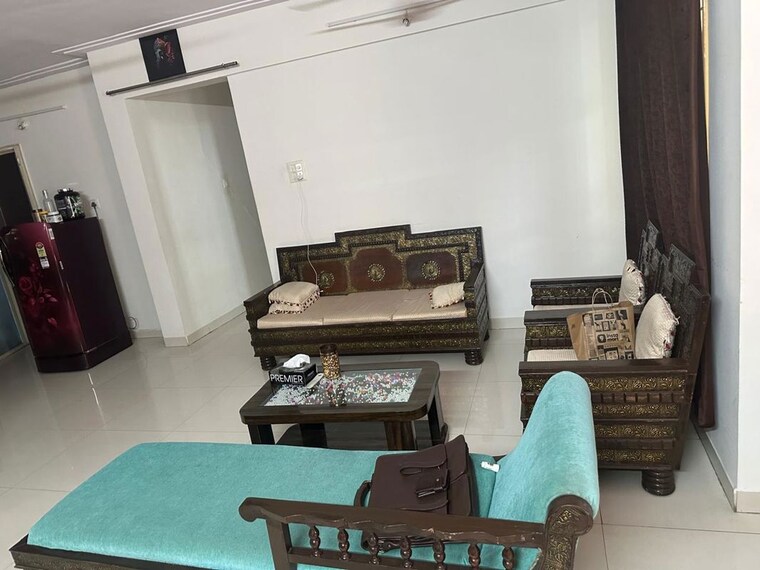 Living Room, comfort-zone 3 Bedroom 1350 Sq.Ft. Apartment In Balewadi Pune 10647386