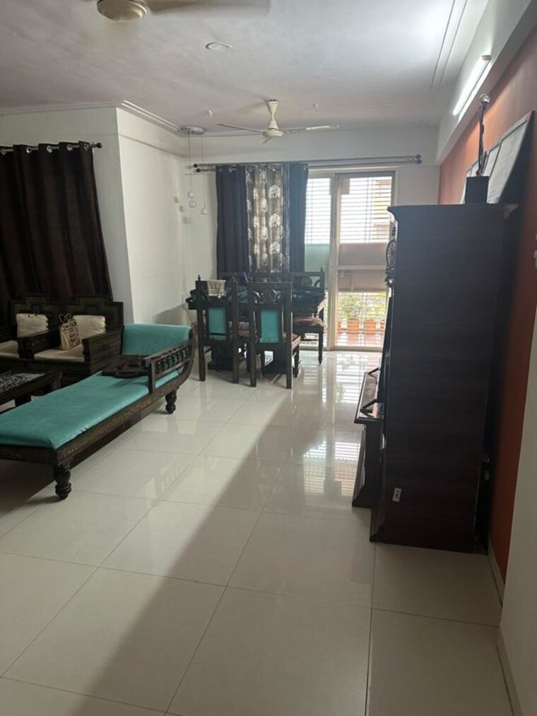 Living Room, comfort-zone 3 Bedroom 1350 Sq.Ft. Apartment In Balewadi Pune 10647386