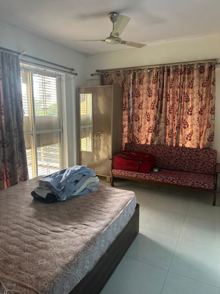 Living Room, comfort-zone 3 Bedroom 1350 Sq.Ft. Apartment In Balewadi Pune 10647386