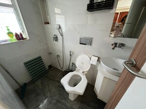 Bathroom in 2 BHK Apartment at Raheja Brooke Ville, Mahim West – for Rent