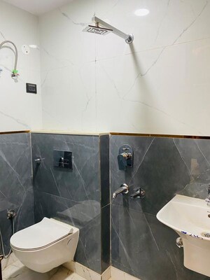 Bathroom in 3 BHK Builder Floor at Dwarka Mor – for Rent