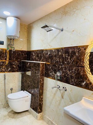 Bathroom in 3 BHK Builder Floor at Dwarka Mor – for Rent