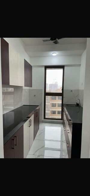 Kitchen in 2 BHK Apartment at Raymond Ten X Habitat, Pokhran Road No Two – for Rent