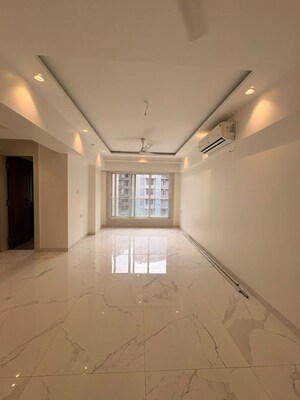 Building Lobby in 2 BHK Apartment at Oshiwara Basera CHS, Andheri West – for Rent