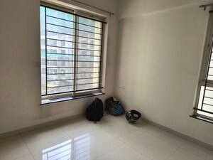 Room in 2 BHK Apartment at Kolte Patil Little Earth, Kiwale – for Rent