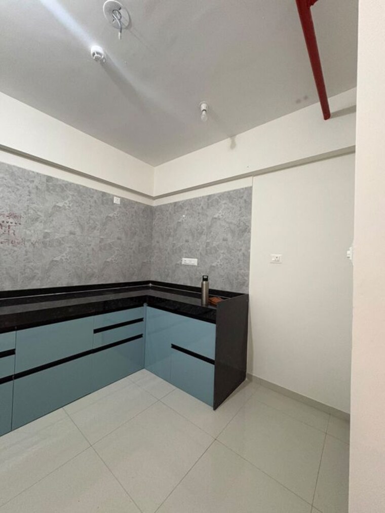 Kitchen, gini-vivante 2 Bedroom 781 Sq.Ft. Apartment In Kiwale Pune 10647992
