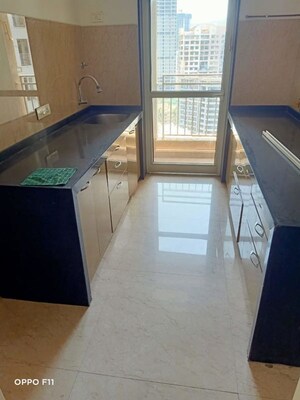 Kitchen in 4 BHK Apartment at Omkar Alta Monte, Malad East – for Sale