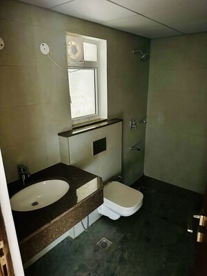 Bathroom in 3.5 BHK Apartment at Godrej Meridien, Sector 106 – for Rent
