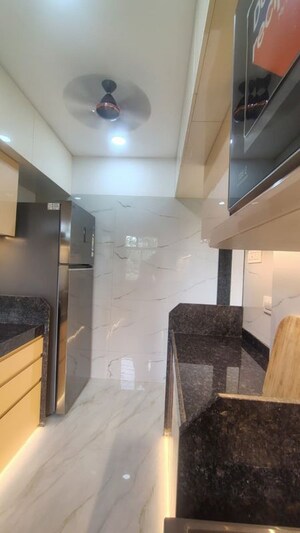 Kitchen in 2 BHK Apartment at Aquarock Aquarose, Malad West – for Sale