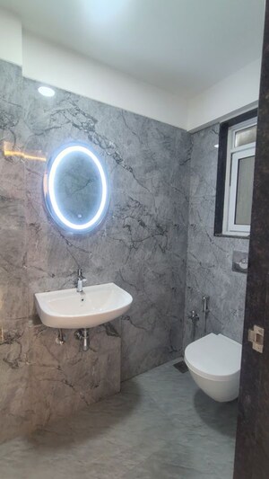Bathroom in 2 BHK Apartment at Aquarock Aquarose, Malad West – for Sale