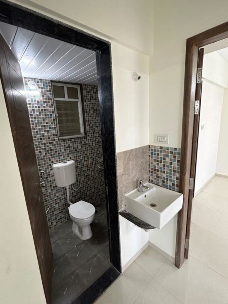 Bathroom, primal-pride 2 Bedroom 703 Sq.Ft. Apartment In Moshi Pune 10648033