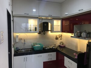 Kitchen in 2 BHK Apartment at Shyama Wisteria, Chikhali – for Rent