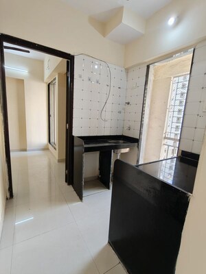 Kitchen in 1 BHK Apartment at Seven Apna Ghar Phase 2 Plot B, Mira Road – for Rent