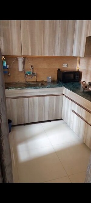 Kitchen in 2 BHK Apartment at Jaypee Greens Kosmos, Sector 134 – for Rent