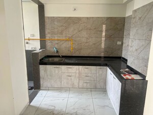 Kitchen in 3 BHK Apartment at Motherland Magnate Legen, Khodiyar – for Rent
