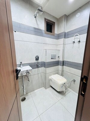 Bathroom in 3 BHK Builder Floor at Dwarka Mor – for Rent