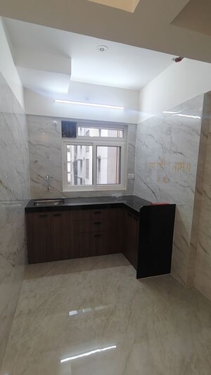 Kitchen in 1 BHK Apartment at Vaibhav Queens Park, Chembur – for Sale
