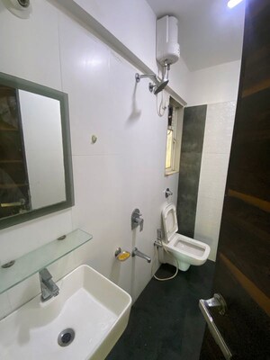 Bathroom in 3 BHK Apartment at Whispering Heights, Malad West – for Rent