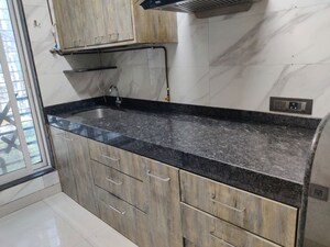 Kitchen in 2 BHK Apartment at Evershine Grandeur, Malad West – for Rent