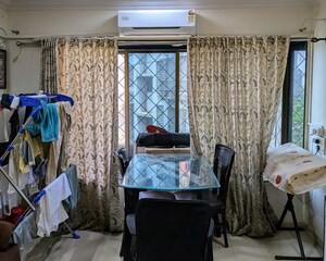 Living Room in 1 BHK Apartment at Hilton Tower, Andheri East – for Rent